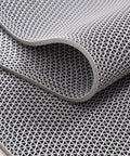 Close-up of unfolded Drainage Non Slip Floor Mat 3 feet by 16.4 feet PVC mesh heavy duty for pool shower bathroom