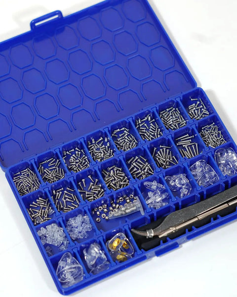 Complete Eyeglass Repair Kit With 1000 PCS In 32 Slot Blue Case featuring organized stainless screws, nose pads, tweezers, and tools.