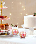 DIY Snow Globe Kit With Ten Clear Plastic Water Globes And Screw Off Caps For Easy Fillable Keepsakes on holiday table