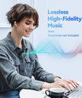 Woman using 64GB Bluetooth MP3 Player With Type C USB 2 In 1 Plug And Play Clip On Design at laptop, high fidelity music