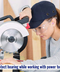 Person using Slim Fit Foam Earplugs For Small Ears With Travel Case while operating power tools