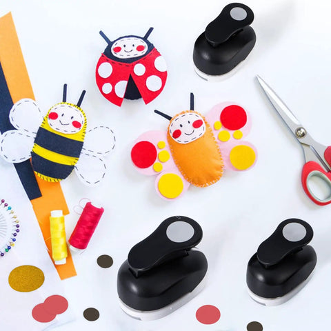 Three Pack Circle Punches Set for Paper Crafts 1.5 Inch, 1 Inch, and 0.6 Inch, black punches with card and foam crafts.