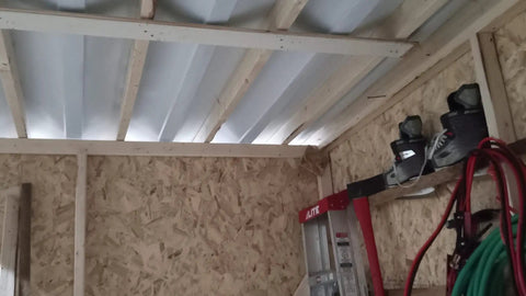 Under Deck Drainage System For 16 Inch Joists, 50 Ft Roll, 30 Mil Thick Trough With Black Top Side And White Bottom installation