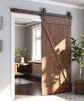 Heavy Duty Sliding Barn Door Hardware Kit In Black for smooth operation, installed on wood door, in a home setting