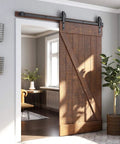 Heavy Duty 5 Foot Sliding Barn Door Hardware Kit For 4 To 18 Foot Rails Black Solid Steel installed on wooden door in living room.