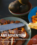Solo Camp Table Set For One 6 Piece Plastic BPA Free Mess Kit with knife, sausages, and bowls on a camping table.
