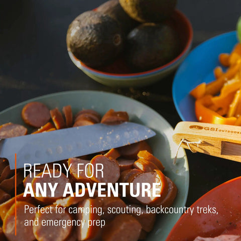 Solo Camp Table Set For One 6 Piece Plastic BPA Free Mess Kit with knife, sausages, and bowls on a camping table.