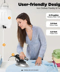 User-friendly design of Heavy Duty Commercial Gravity Steam Iron With Titanium Coated Stainless Steel Soleplate, water tank, and silicon hose.