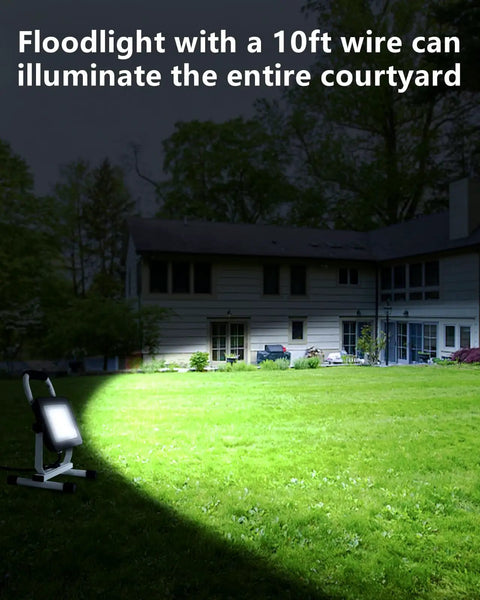 6000 Lumen LED Work Light With Stand Waterproof Flood Light 60W illuminating a courtyard at night, showcasing its brightness.