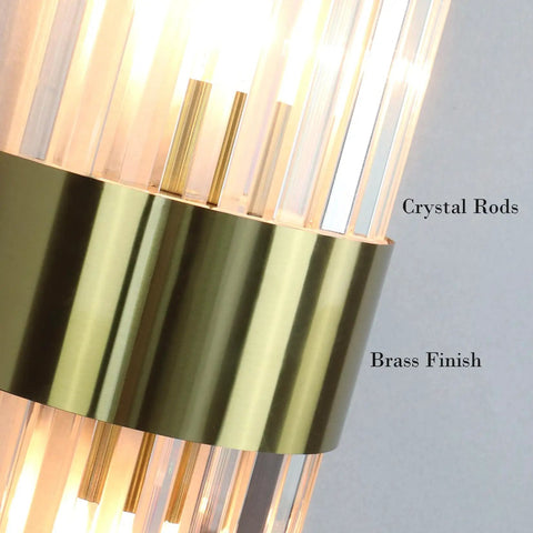 Close-up of Gold Wall Sconces Set Of Two Modern Crystal Sconce Lighting with brass finish and crystal rods detail.