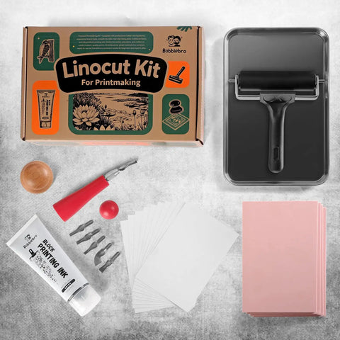 Linocut Printmaking Kit For Adults With Linoleum Blocks And Stamp Making Tools including ink, roller, and carving tools on table.