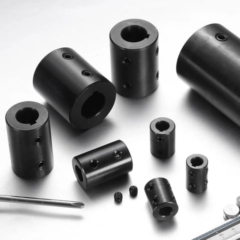 Heavy Duty Rigid Shaft Coupling Machined From Black Oxide Carbon Steel For Zero Slack Torque Transfer On 3D Printers And Motor Drivers Featuring Locked In Set Screws Built Legit And Ready To Go, showcasing various sizes and details.