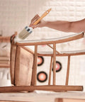 Applying paint to chair with 1.6 inch brush from Complete Home Paint Supplies Kit With Round Sponge Applicator, 1.6 Inch Paint Brush, 3 Inch Roller Brushes, And Paint Tray Liner For Walls, DIY Finish All In One Pro Grade Set.