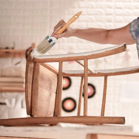 Applying paint to chair with 1.6 inch brush from Complete Home Paint Supplies Kit With Round Sponge Applicator, 1.6 Inch Paint Brush, 3 Inch Roller Brushes, And Paint Tray Liner For Walls, DIY Finish All In One Pro Grade Set.