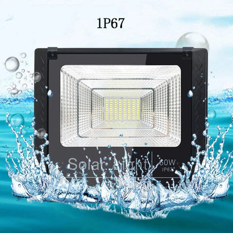 JUDYSSY Solar Flood Lights 60W Solar Outdoor Patio Lighting in water, showcasing IP67 waterproof rating and LED design.