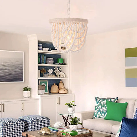 Wood Beaded Farmhouse Chandelier With White Finish And Adjustable Cord in living room setting