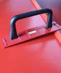 16 Inch Drip Edge Folding Tool on red metal surface, showing long handle and rib-reinforced steel construction, for 1 and 1.5 inch folds