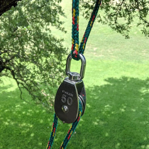 M50 Single Pulley Block 4 Pack Heavy Duty Stainless Steel Pulley System With 881 Lb Load Capacity on colorful rope outdoors