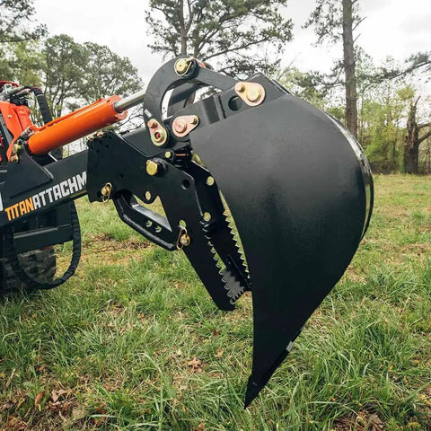 Skid Steer Fronthoe Attachment With 14 Inch Bucket And Bolt On Backhoe Thumb For Universal Quick Attach, side view in field