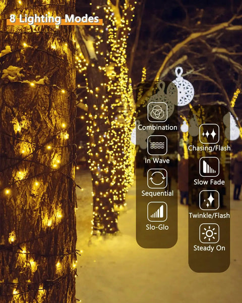 2Pack 500LED Solar String Lights Outdoor Waterproof 180FT With 8 Modes IP65 Warm White Twinkle illuminating snowy trees