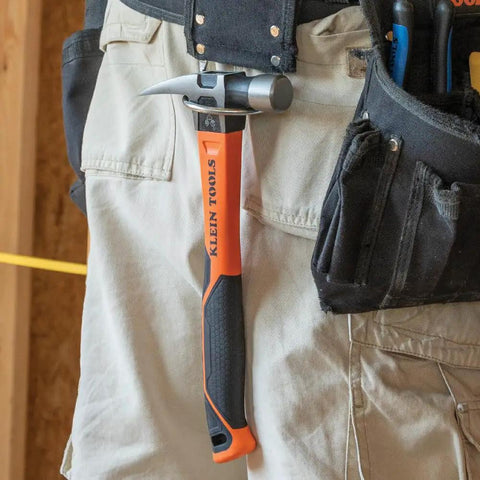 Heavy Hitting 16-Ounce Straight-Claw Hammer With Smooth Head, 13-Inch Length, Fiberglass Shock Absorbing Grip shown on tool belt