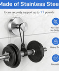 Heavy Duty Black Suction Cup Hooks Two Pack No Drill Bathroom Wall Adhesive Rack For Towels Robes And Fitness Gear Featuring Hella Strong Silicone Base That Snags Tight On Glass Or Tile With Zero Hassle with black weights secured to stainless steel hook on tile.