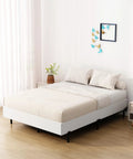Rock Solid King Size Box Spring With Seven Inch Steel Bed Base Foundation and Dust Resistant Fabric Cover For Silent Nightly Rest and Quick Setup with Pro Grade Structural Support Inside in modern bedroom.