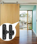 Heavy Duty Black Sliding Barn Door Lock Set, 2 Pack With Adjustable 90 To 180 Degree Latch shown installed on a wooden door.