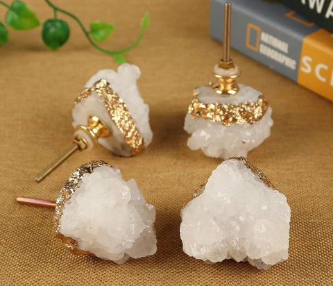 Four Pack Beefy Natural Quartz Geode Cabinet Knobs Combined With Slick Druzy Crystal Drawer Handles Featuring Clean Gold Plated Edges.