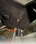 Suede headliner fabric with foam backing, black, installed on vehicle roof interior