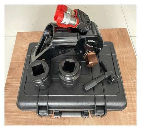 Heavy Duty Hydraulic Torque Wrench One Point Five Inch Square Drive 742 To 7420 Nm Range with accessories on a protective case.