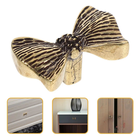 Copper Bowknot Cabinet Handle And Drawer Pull Kit In Vintage Brass Finish, close-up of decorative bow detail