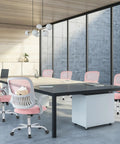 Ergonomic Mesh Office Chair For Home With Mid Back Support Rolling Swivel Desk Chair Lumbar Comfort Comfy Flip Up Arms Pink Ideal For Bedroom Study Student Use in modern meeting room setting.
