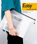 Person holding large mesh bag from Multisize Mesh Zipper Pouches Set Black Water Resistant Zip Bags For School Office Supplies