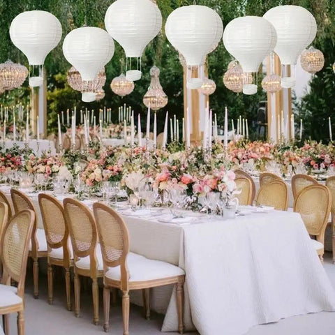 Elegant wedding setup with 10 Pack White Hanging Hot Air Balloon Paper Lanterns 12 Inch Party Ready DIY Decor, reusable and easy to assemble.
