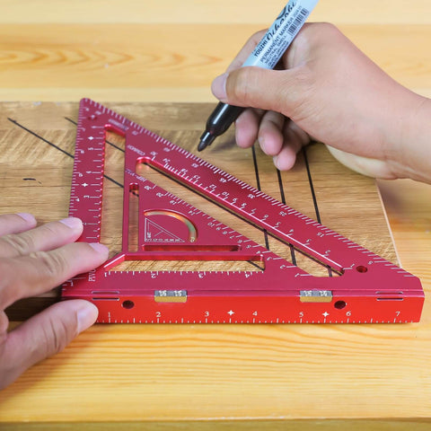 Person using a 7.5-Inch Magnetic Rafter Square With Jig Block Multi-Angle Measuring Tool in red for precise carpentry on wood.