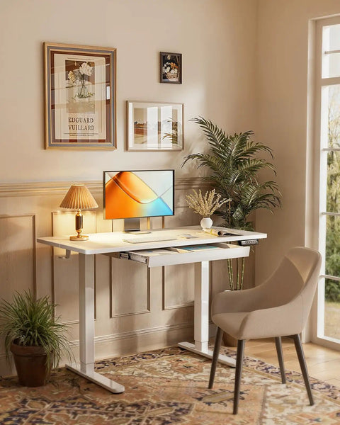 Electric Standing Desk With Drawers 48 By 24 Inch Height Adjustable Table With Four Presets in a home office setting.