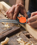 Person using Digital Angle Finder Protractor 0-360 Degrees with T Bevel Gauge on wood during woodworking project