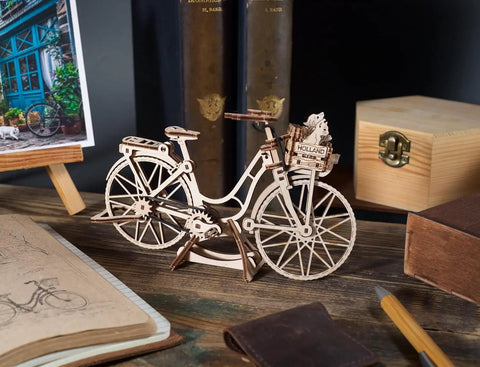 Hands On Dutch Bicycle 3D Puzzle Model With Rear Rack And Front Basket Amsterdam Themed Mechanical Toy For Brain Teaser Fans Includes Tiny Cat Dog And Flower Figures For The Basket. Wooden 75-piece model on stand