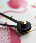 Detail of the black metal hands on the Killer 10 Point 5 Inch Silent Wall Clock Boasting A Crisp Red Dart Pin Graphic.