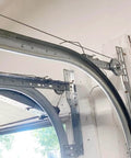 Close-up of installed Built To Last 1.5mm Steel R12 Horizontal Garage Door Tracks for 7 Foot Doors 2 Inch Rail Pair