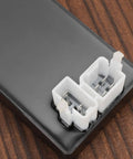 6 Pin DC CDI Box Replacement For 150Cc 200Cc And 250Cc Vertical Engines in ATVs close-up view of connectors on wooden surface