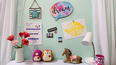 Desk with decorations and wall used as magnetic canvas with Magnetic Paint And Primer For Any Surface High Yield Black 8 Oz