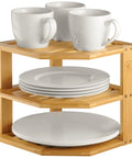 Total Kitchen Game Changer, Super Handy Bamboo Corner Shelf, 3 Tier Plate Rack displaying mugs and plates.