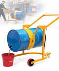 Heavy Duty Drum Lifter Cart Cranks Up To 660 Lbs And Tilts For Easy Pouring Of Steel Or Plastic Barrels With Safe One Man Lift Action At The Factory with a blue barrel and red bucket.