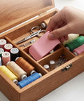Hand using Seam Guide With Magnetic Alignment For Sewing Machines, Easy Clamp Tool For Precise Stitching, in sewing box.