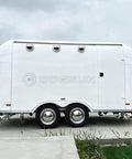 Premium Fully Equipped Food Trailer With Complete Mobile Kitchen Setup designed for street vendors, featuring a sleek white exterior.