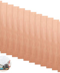 Twelve Piece Pure Copper Anode Sheets For Electroplating Strips Sized At Point Zero Zero Four X One X Six Inches arranged neatly.
