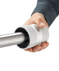 Ridgid stainless steel pipe reamer tool with chrome finish, 1/2–2 in range, held in hand (side view)