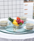 Large Round Glass Lazy Susan Turntable For Dining Tables 360 Degree Swivel Serving Tray Clear Tempered Glass 47 Inch Ideal For Banquets Parties And Family Dinners Smooth Low Noise Rotation with fruit bowl.